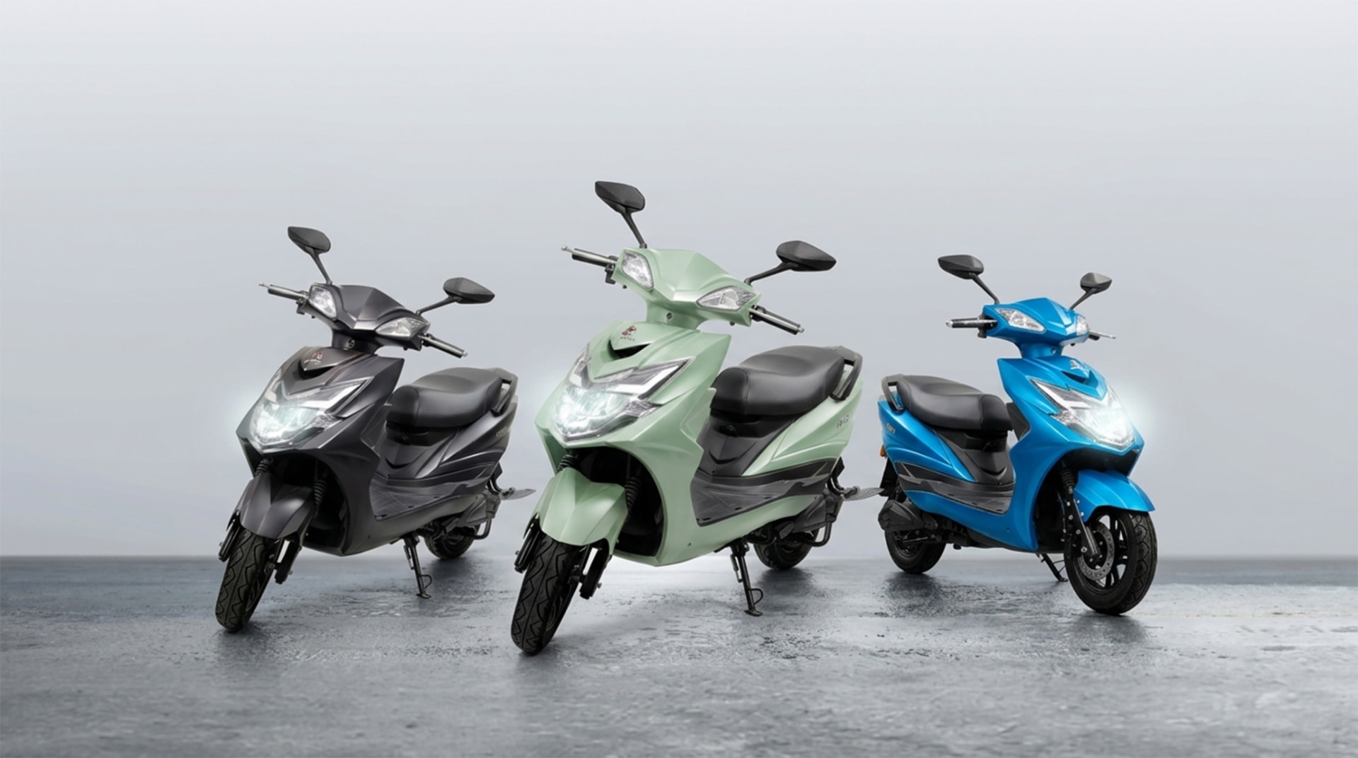 Line-up of three GAURA G6 electric scooters in different colours
